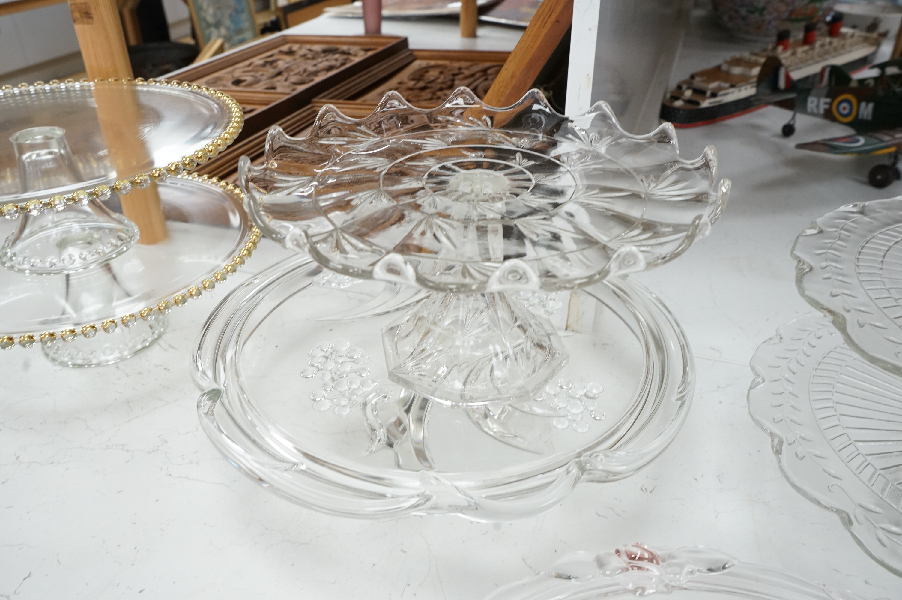 Seven decorative 20th century glass cake tazza, largest 36cm diameter
